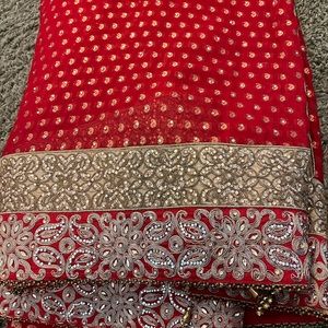 Heavy red thick border saree